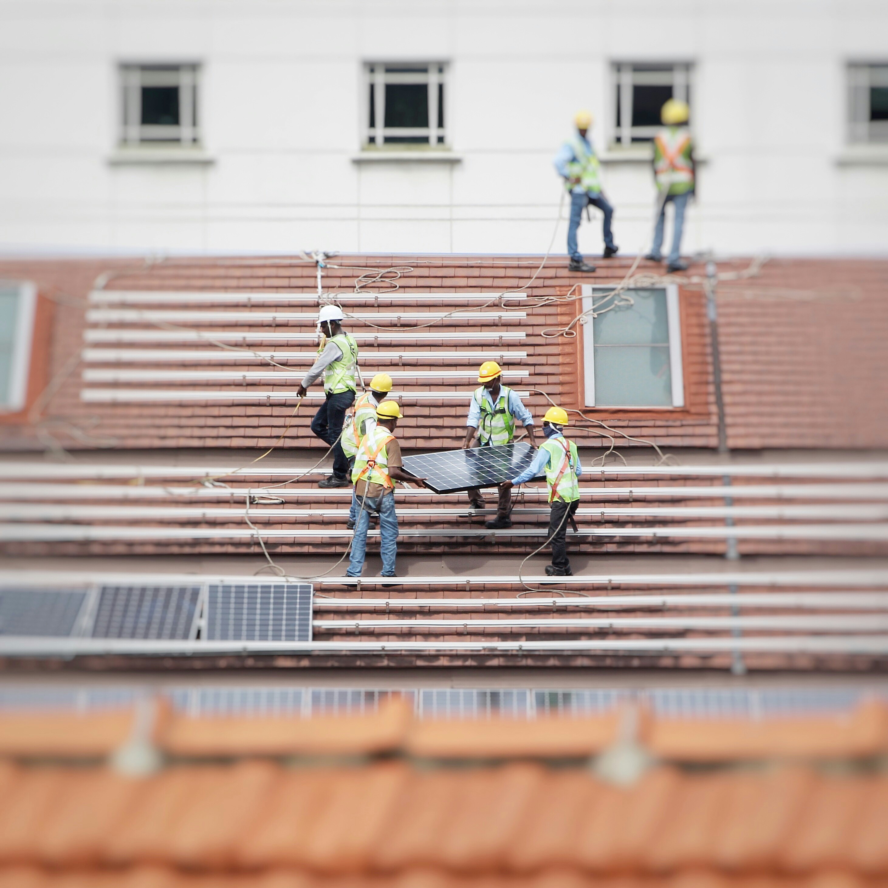 Solar installation crew on a roof