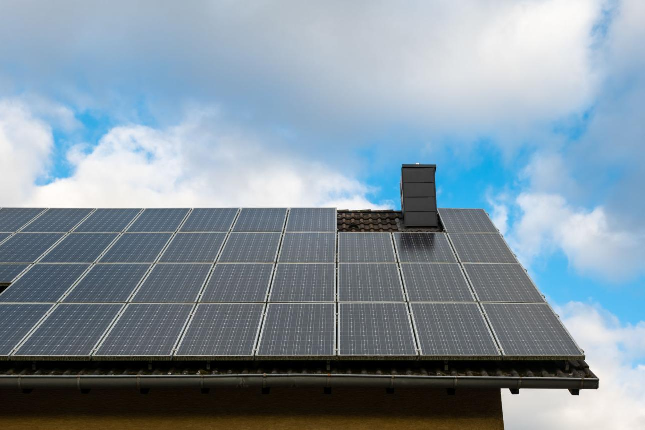 Close-up of rooftop solar panels installed on a residential roof